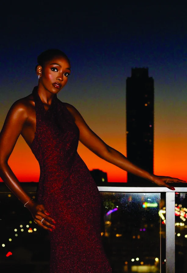 Chioma Obiadi on a balcony at dusk
